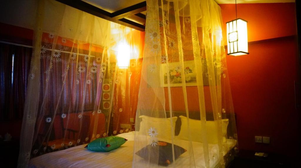 Lijiang Wangjia Courtyard Inn Номер фото